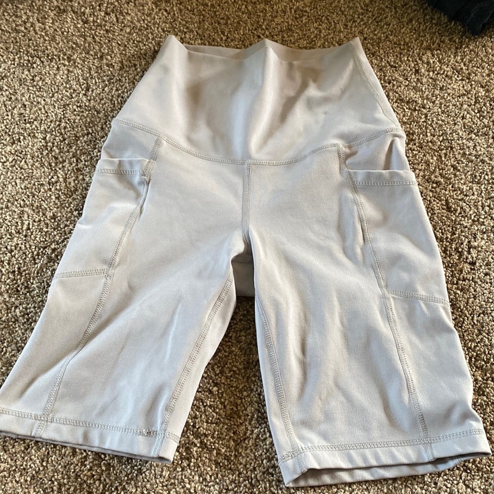 Light grey bike shorts size small with pockets!